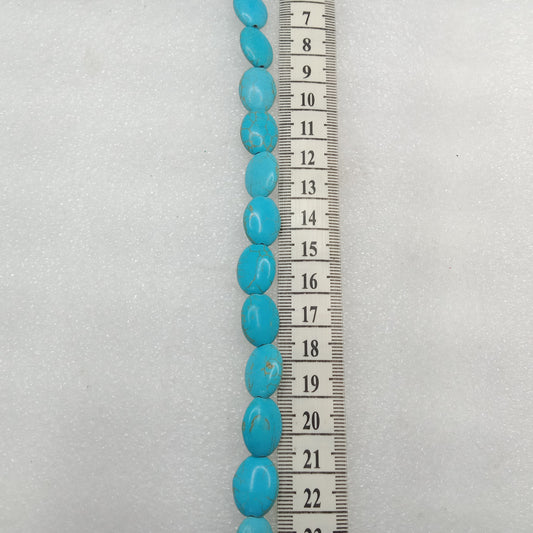 Small flat oval shape turquoise beads 1 string