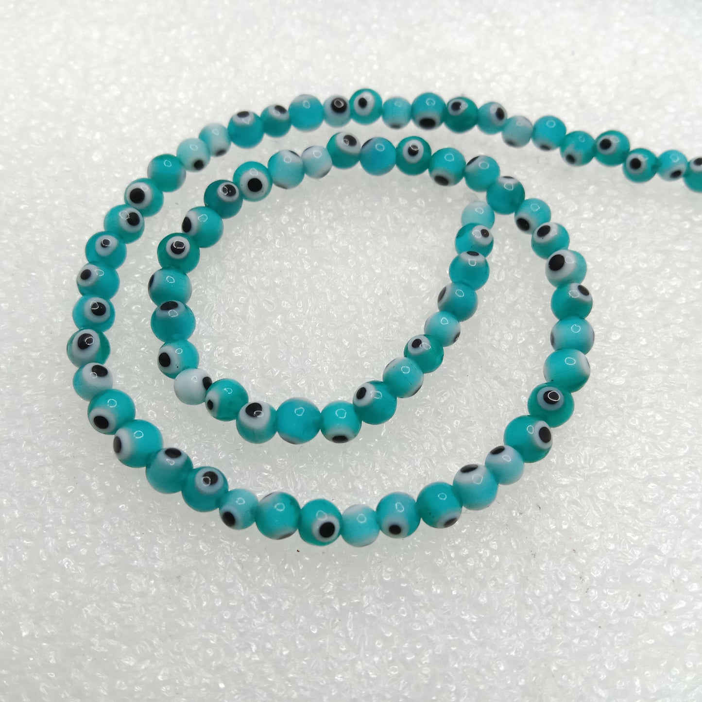 Sea green Evil eye round shape beads 4mm 1 string
