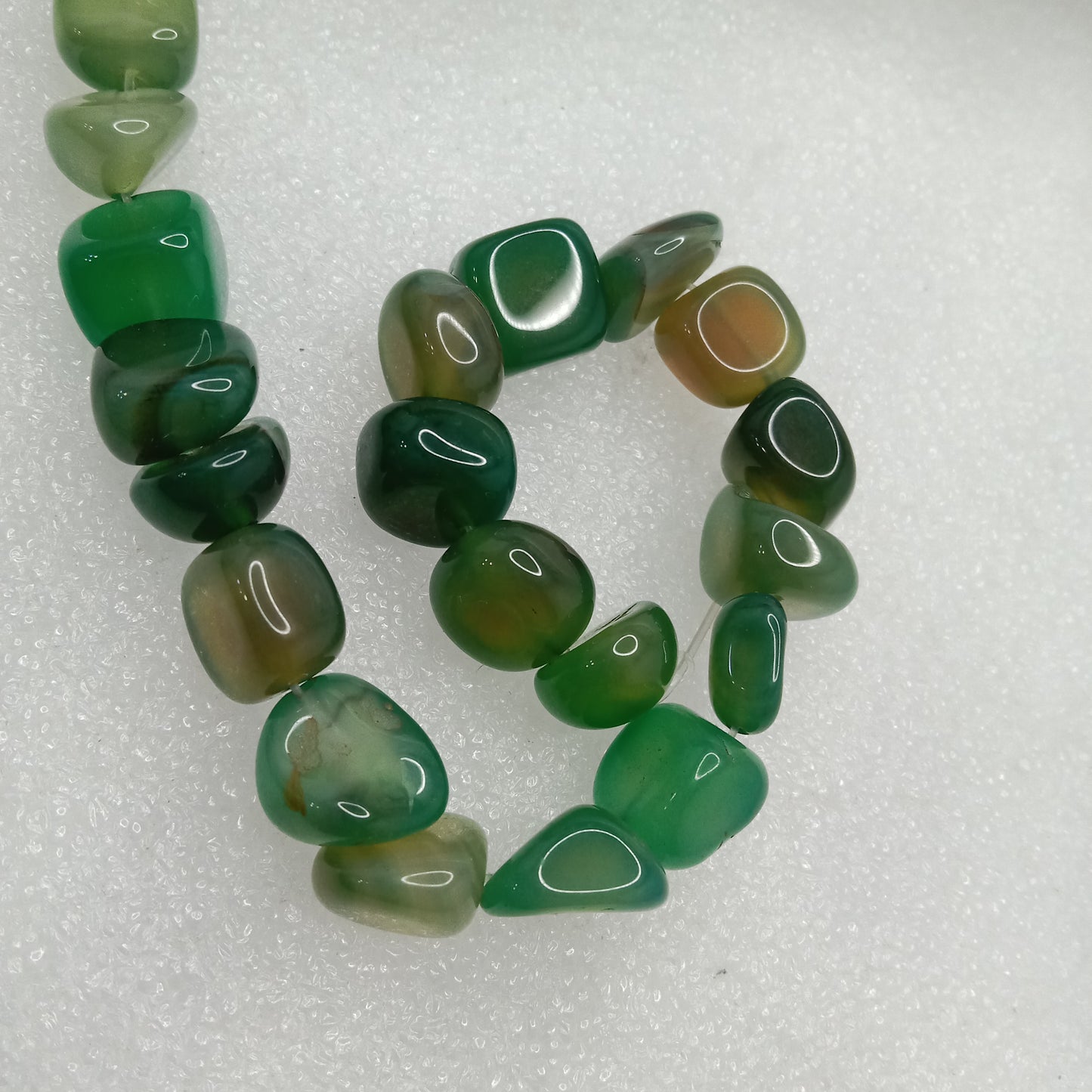 Shaded green tumblestone beads