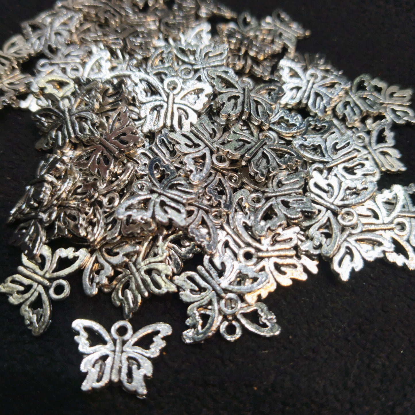 Open butterfly silver oxidized charms 15mm 1 pkt 100 pcs.