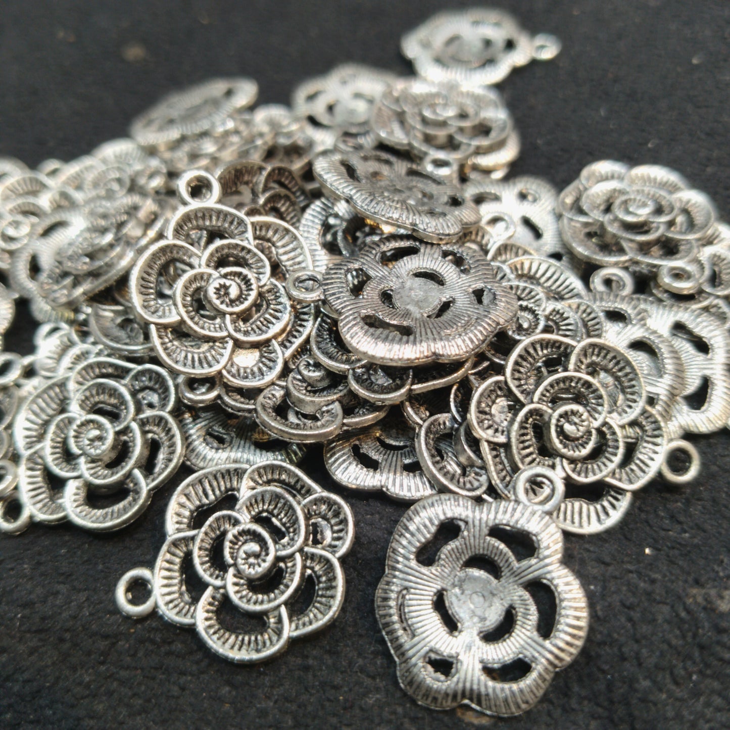 Oxidized silver charms blooming flowers 16mm 1 pkt 60 pcs.