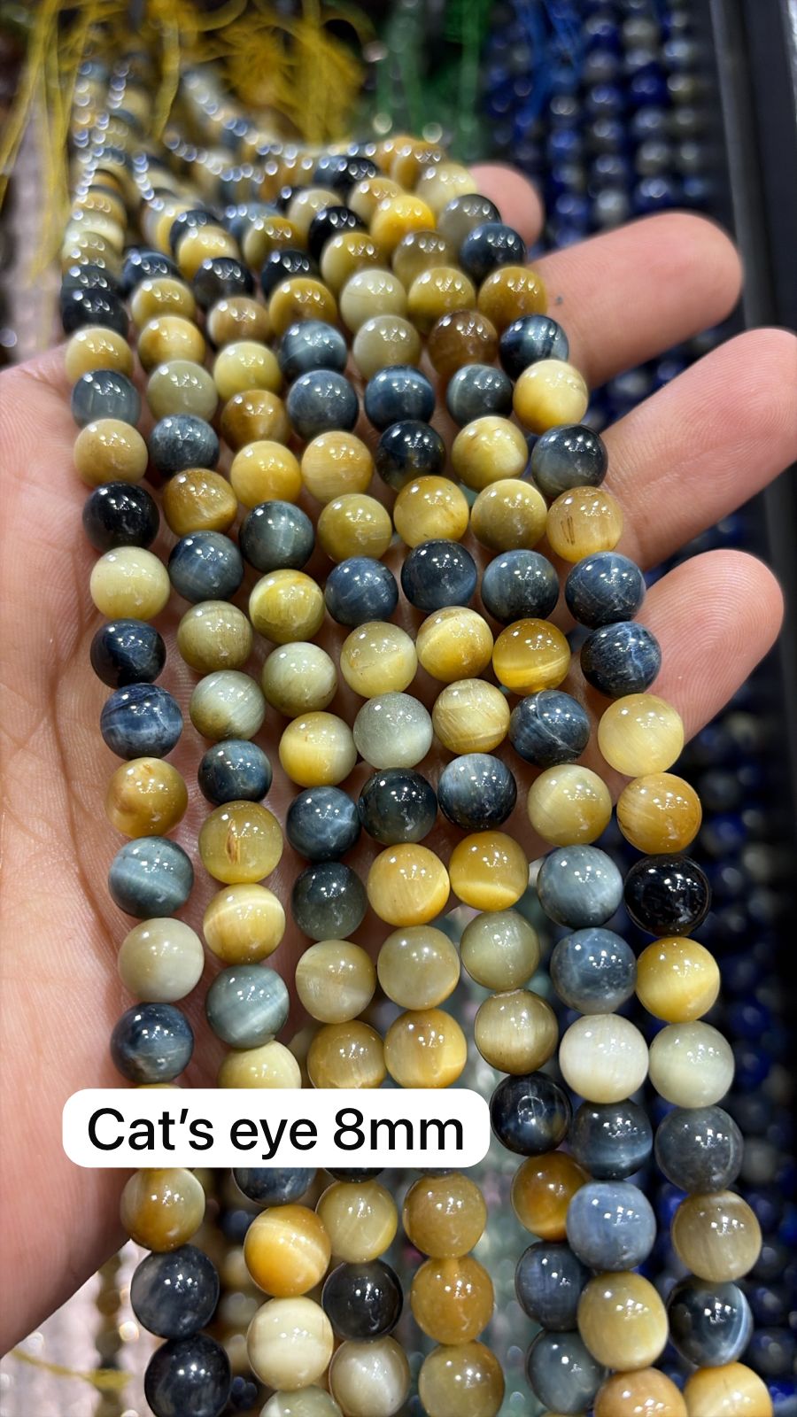 Shaded cat eye high quality round shape 8mm 1 string.