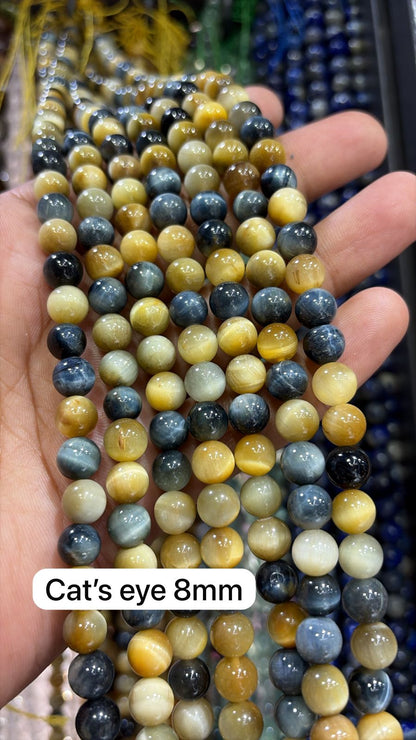 Shaded cat eye high quality round shape 8mm 1 string.