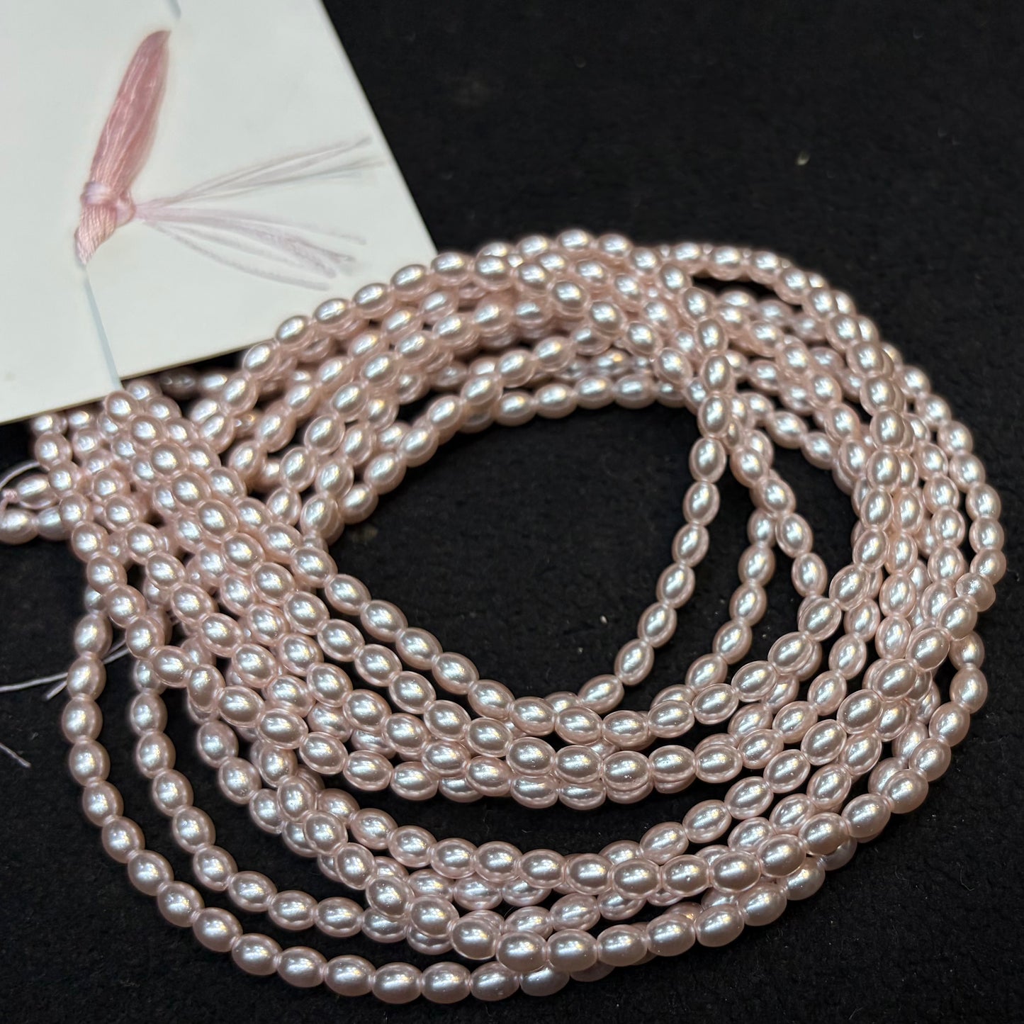 Metallic Pink colour high quality oval shape pearl beads 1 string.
