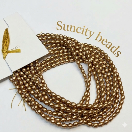 Metallic Dark golden colour high quality oval shape pearl beads 1 string.