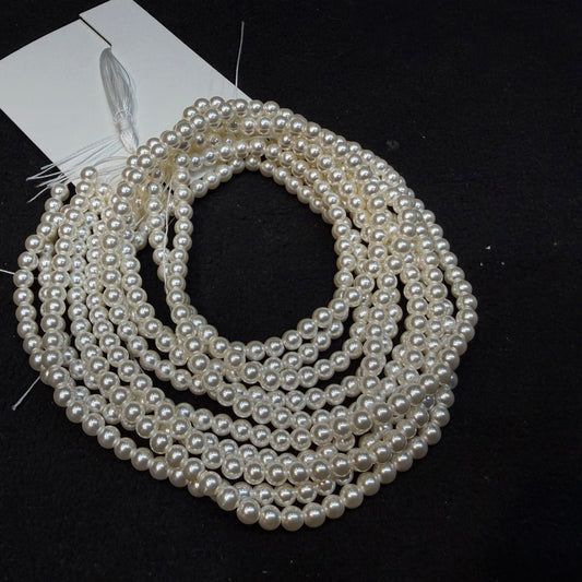 Metallic off white colour high quality round shape pearl beads 1 string.