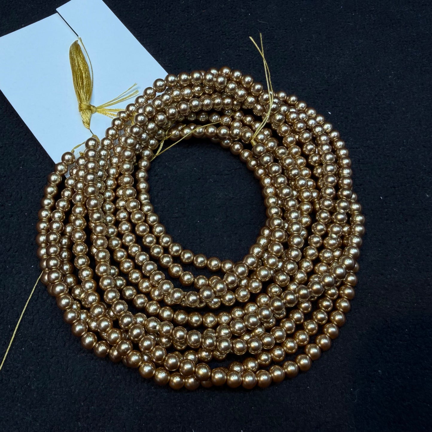 Metallic Dark golden colour high quality round shape pearl beads 1 string.