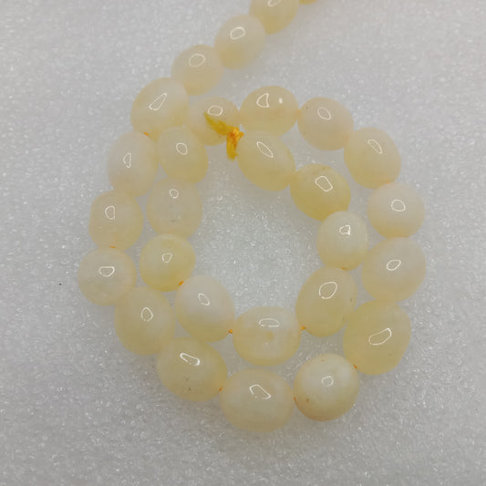 Light yellow High quality tumble duldul stone beads 1 string