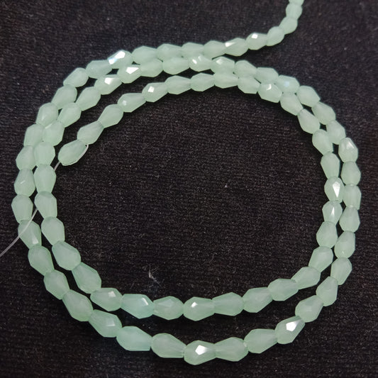 high quality light green small drop shape crystal beads 3x4mm 1 string