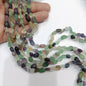 Multi color fluorite tumbel stones beads 1 string