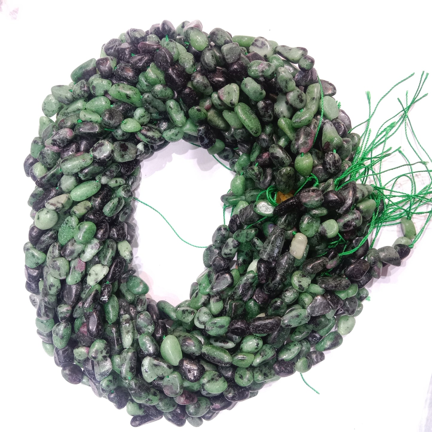 Green or black  tumbel stones beads 1 string