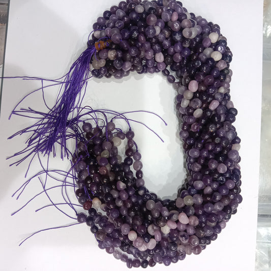 Amethyst tumbel stones beads 1 string