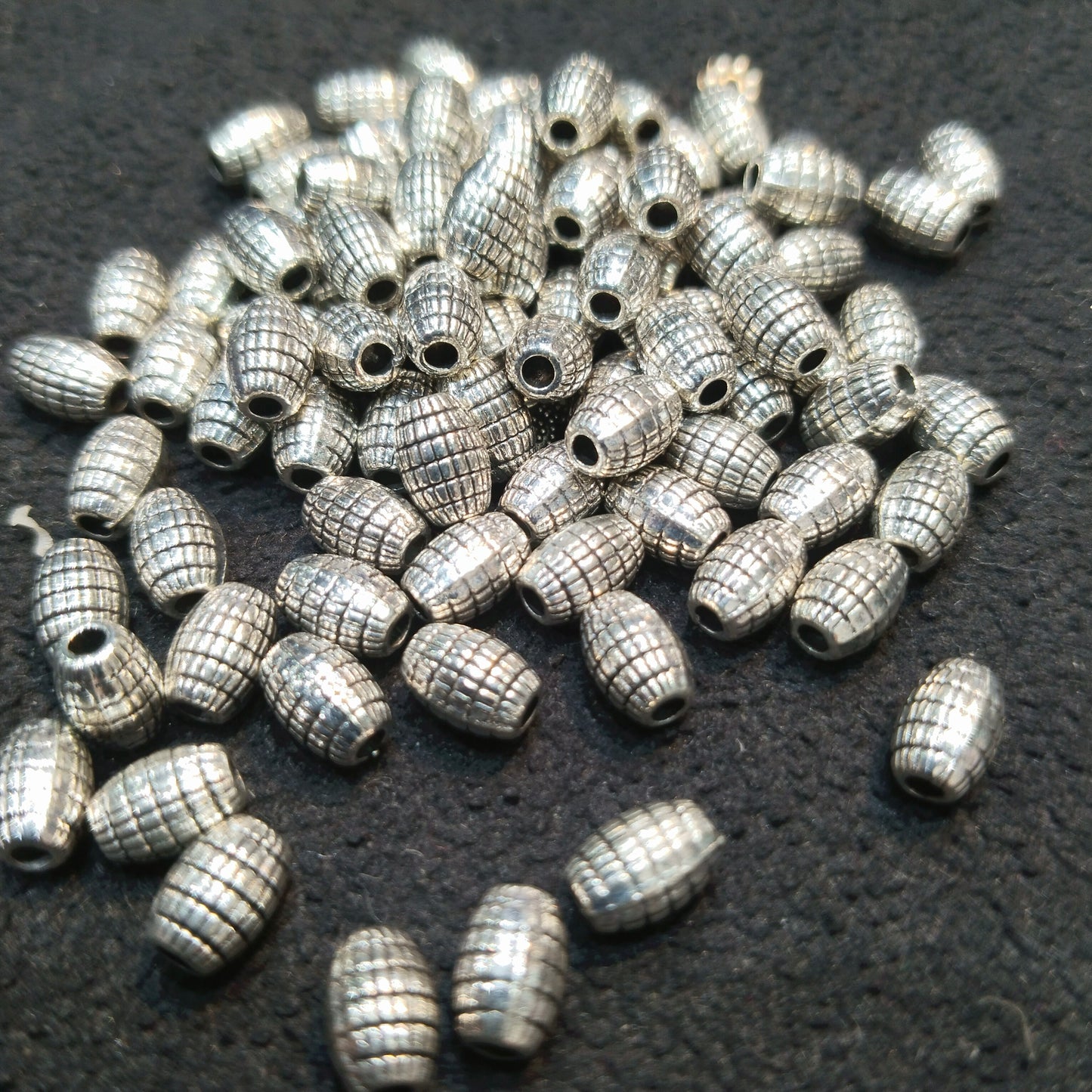 Ribbed silver oxidized metal oval shape beads 1 pkt 100 pcs