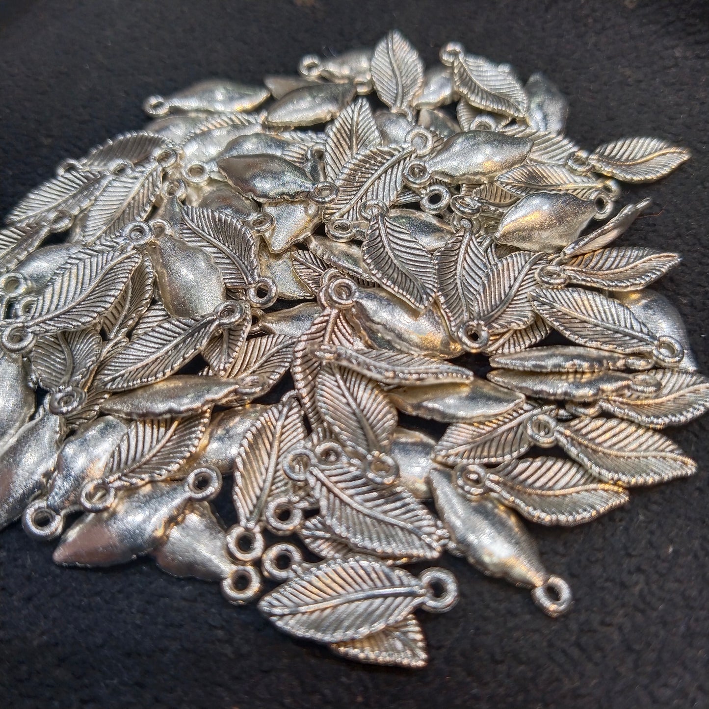 Oxidized silver broad leaf charms 14mm 1 pkt 60 pcs.