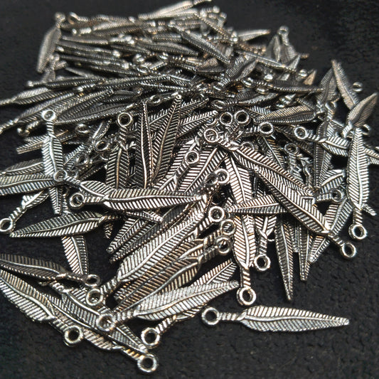 Oxidized silver feather ribbed charms 18mm 1 pkt 60 pcs.