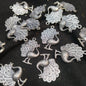Silver oxidized metal peacock 25mm 1 pkt 50 pcs.