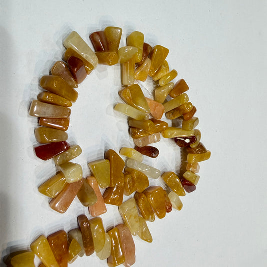 Lite brown texture Uncut stones  Beads 1 String