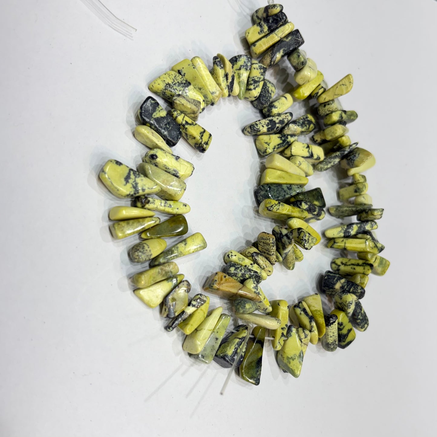 Serpentine tumbeled Uncut stones Beads 1 String