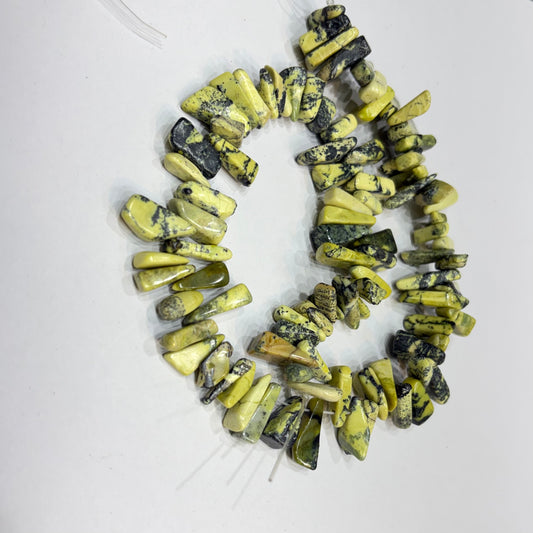 Serpentine tumbeled Uncut stones Beads 1 String