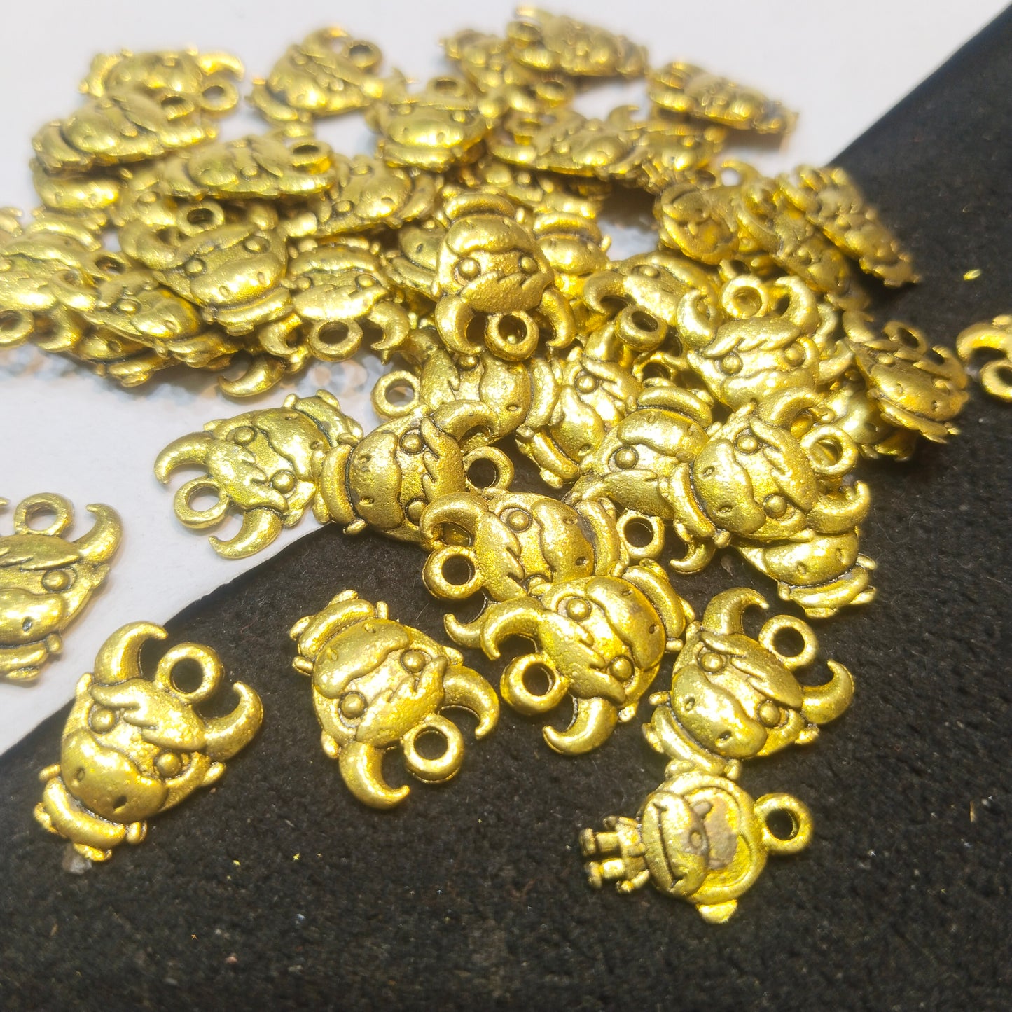 Oxidized gold ox head charms 14mm 1 pkt 60 pcs.