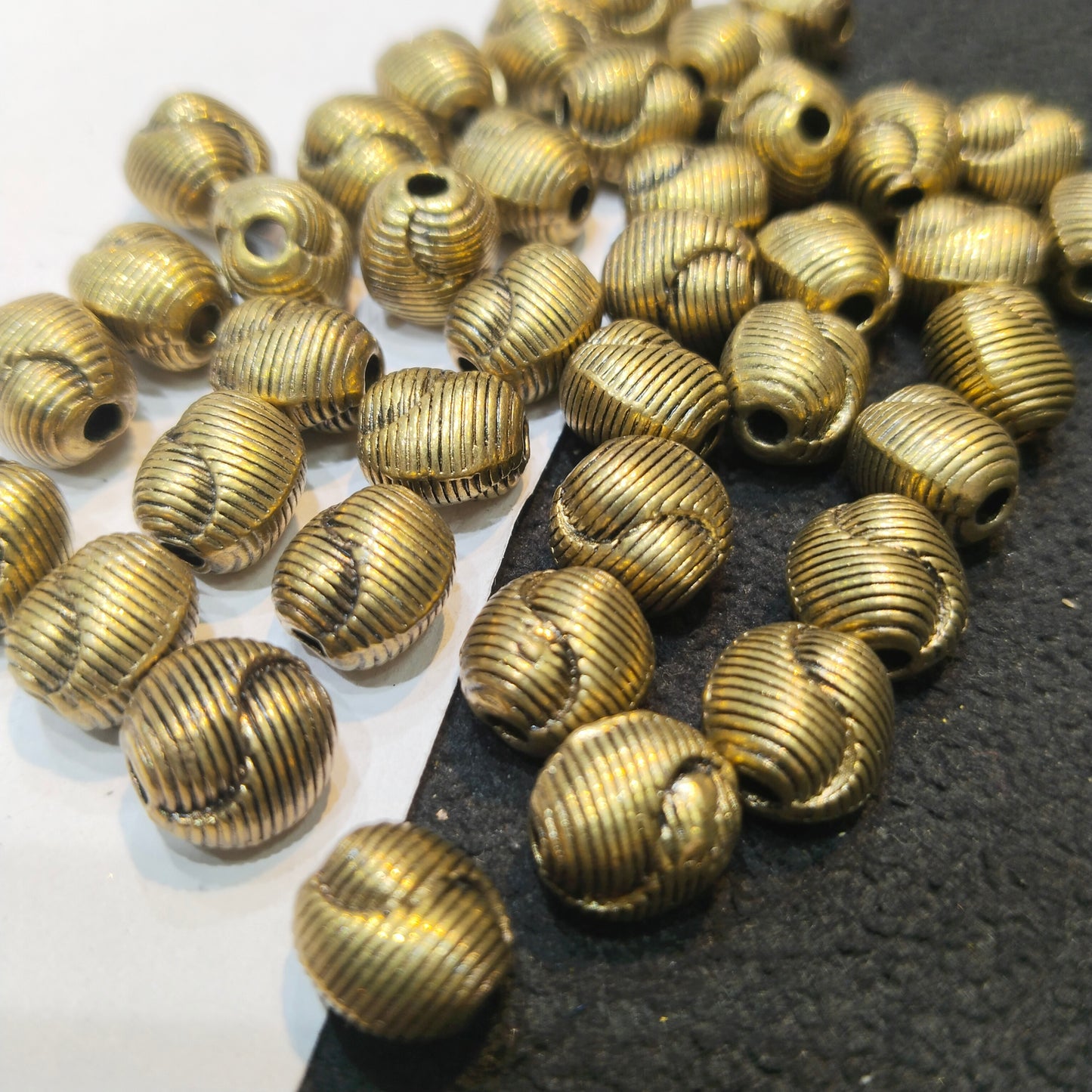 Oxidized gold plated textured barrel beads 12mm 100 pcs.