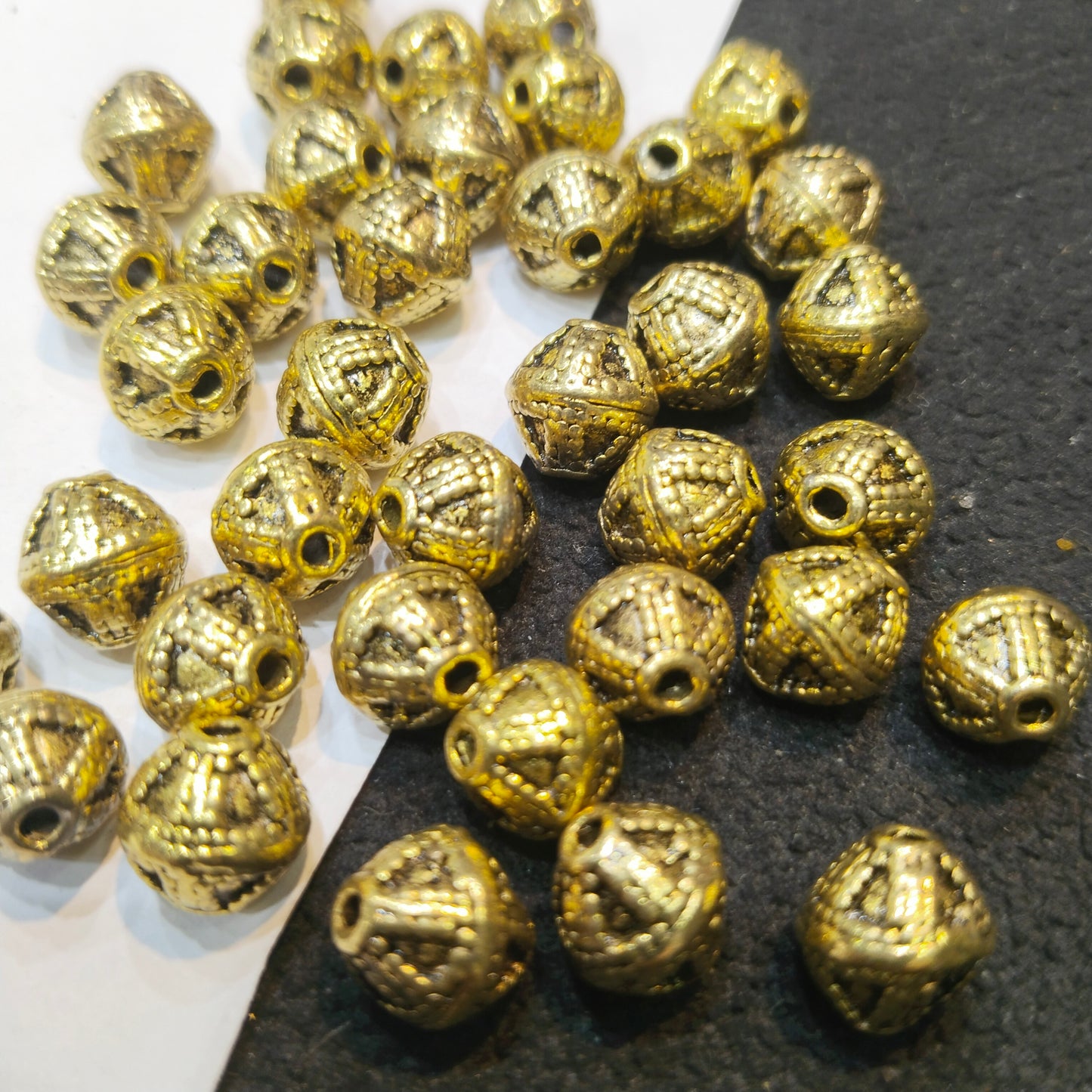 Oxidized gold plated textured bicone beads 14mm 60 pcs.