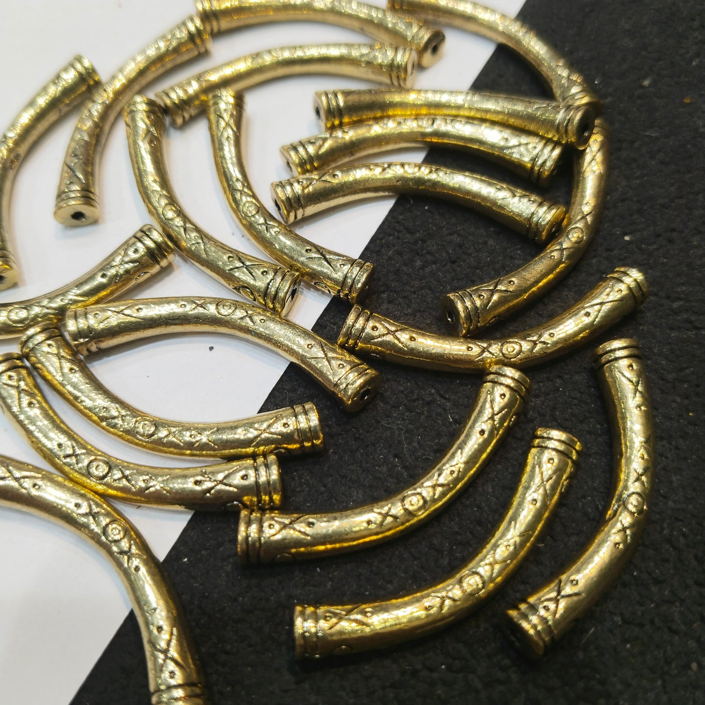 Oxidized gold finish curved noodle beads 30mm 60 pcs.
